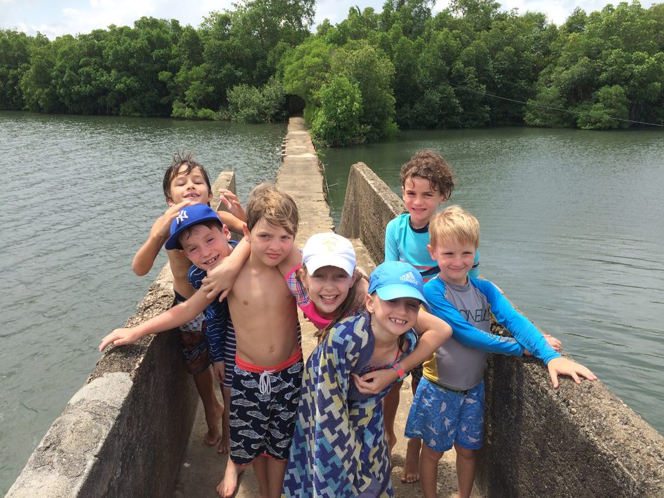 Kids exploring the causeway at Koggala Lake