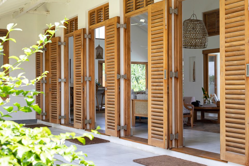 Louvred shutters opening from the living space to the garden