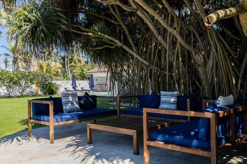 Garden seating on the lawn at Tea Tree Villa