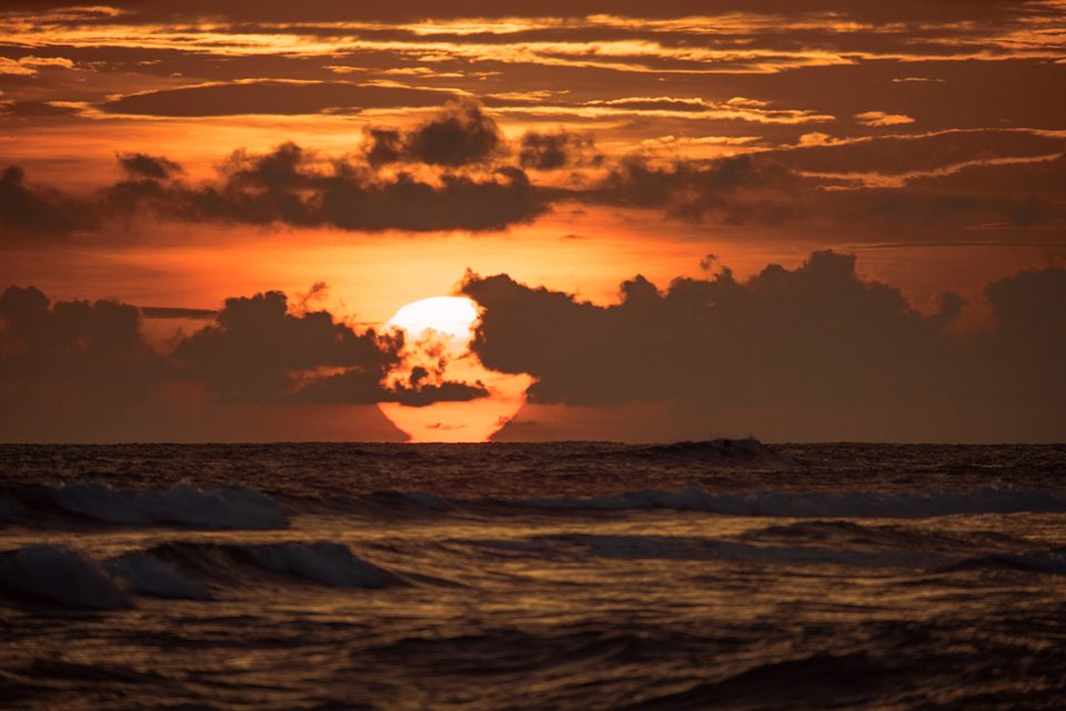 Sunset clouds over the surf at Ahangama