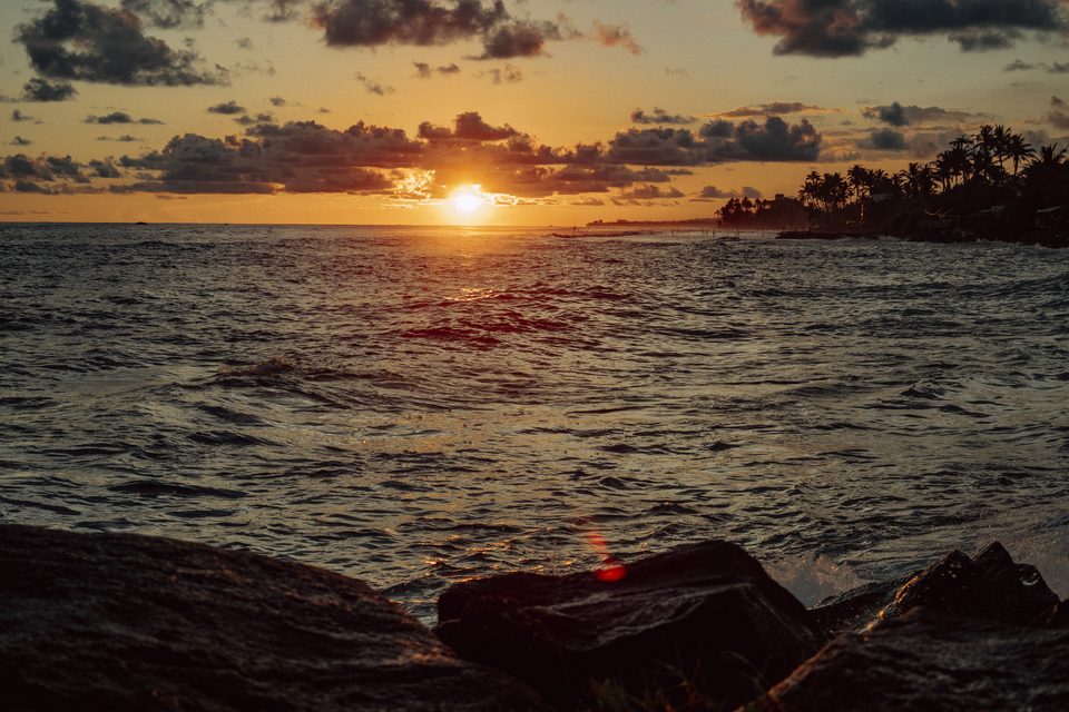 Sunset over the headland rocks on the South Coast