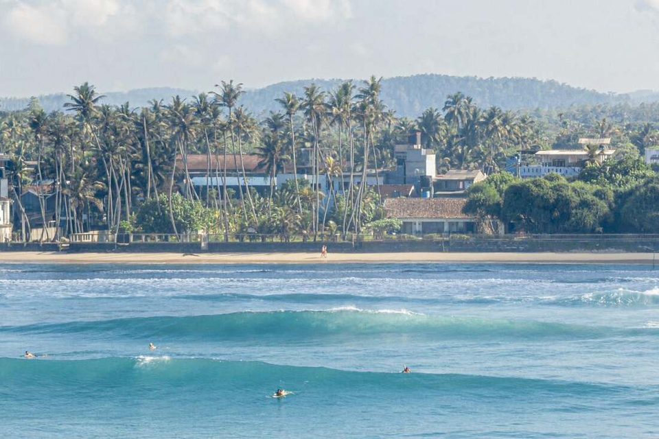 Clean lines and empty peaks on the Ahangama coast